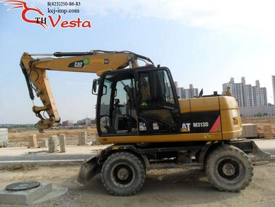 Колесный Экскаватор Caterpillar  M313D, 2009 год 