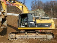 Продается  гусеничный экскаватор Caterpillar 325 2007 год .